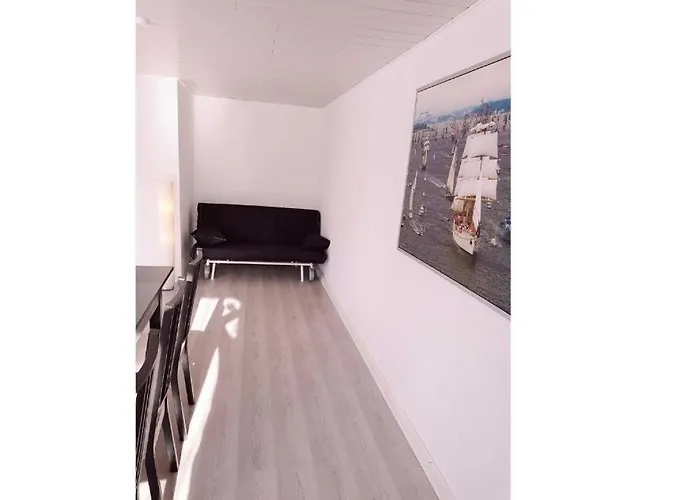 Ferienhaus Heimathafen direkt am Strand mit eingez Garten